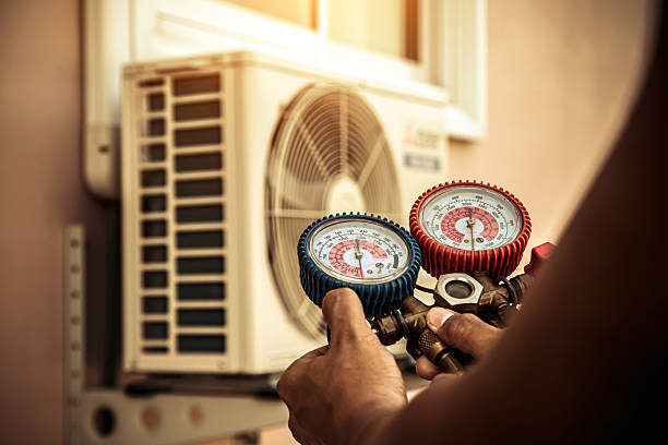 Professional Hvac technician working in Hanover, MA